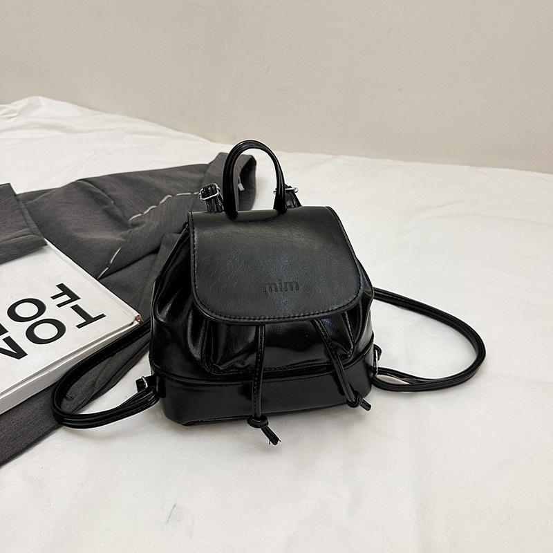 Летний популярный новый красивый изысканный однотонный рюкзак изысканный маленький универсальный легкий рюкзак женский чёрный